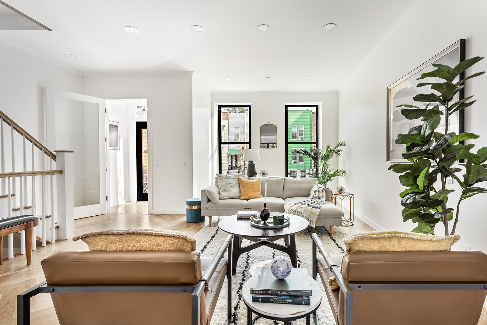 95 Moffat Street Brooklyn, NY 11207 - Photo 5 of 18 a living room with furniture and a potted plant