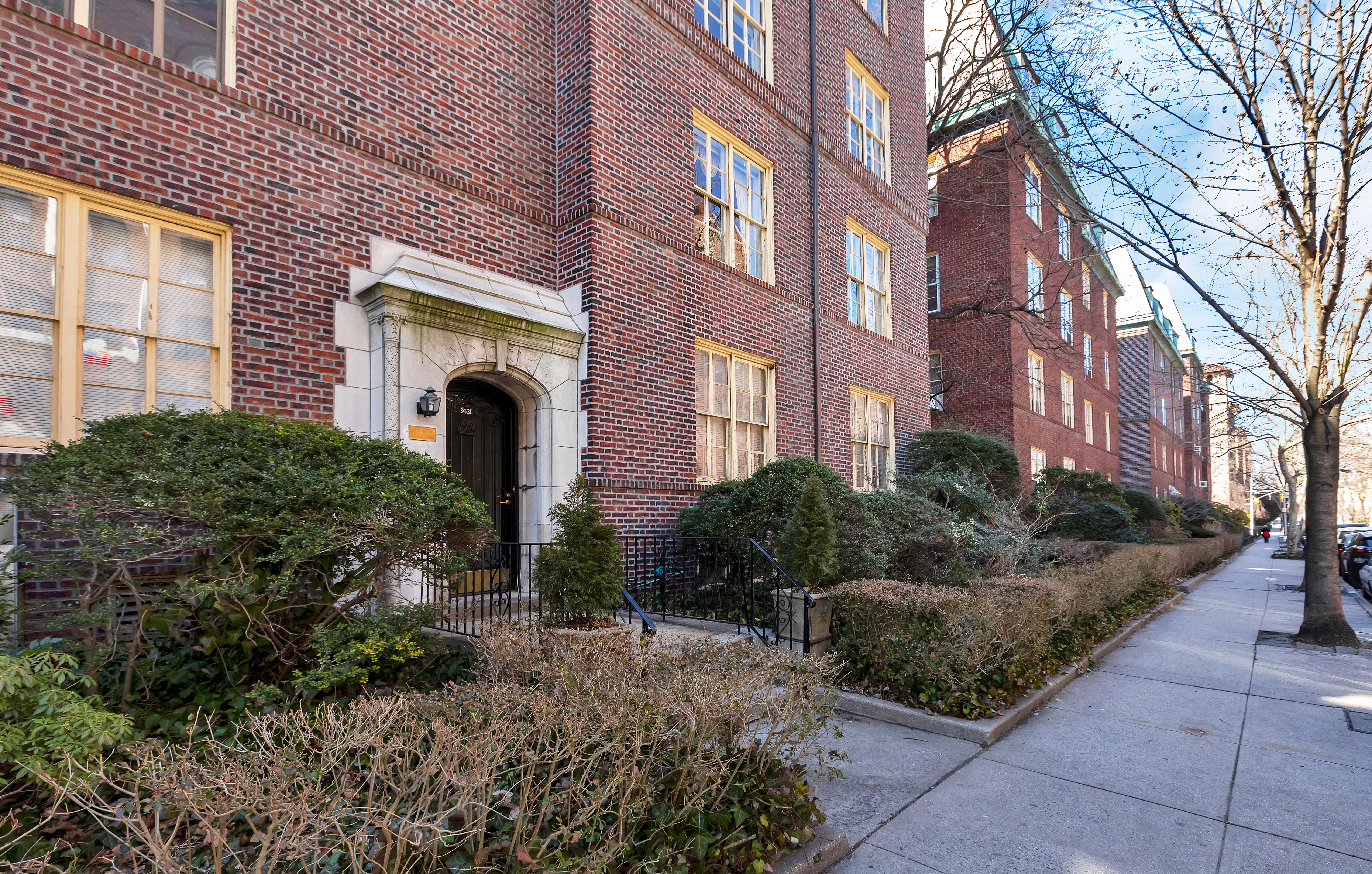 34-30 81st Street, Unit 2 Queens, NY 11372 - Photo 1 of 3 a front view of a house with garden