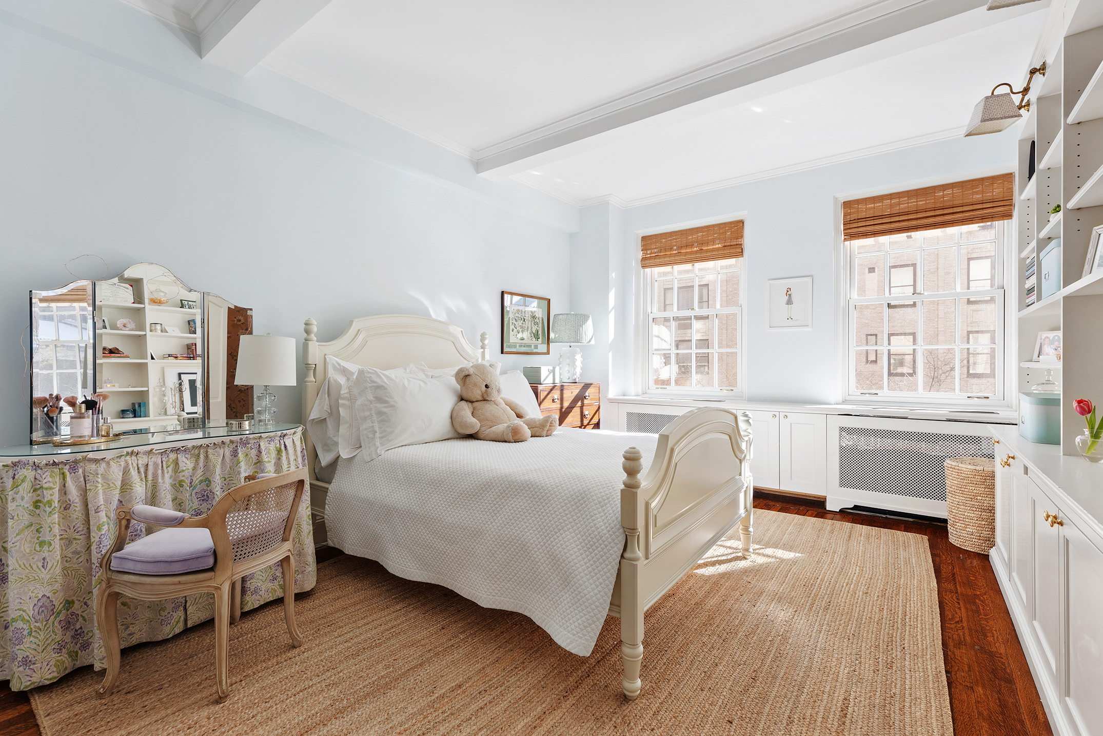 133 East 80th Street, Unit 3A Manhattan, NY 10075 - Photo 10 of 19 a room with a bed and a chair