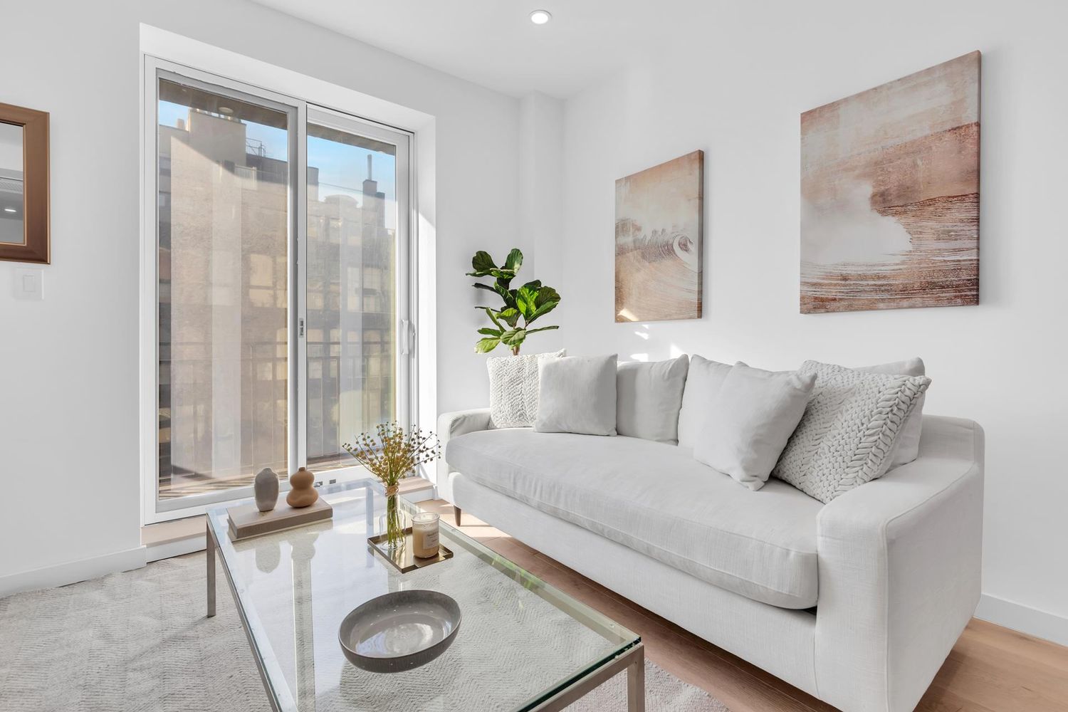 250 Manhattan Avenue, Unit 3F Brooklyn, NY 11211 - Photo 2 of 7 a living room with furniture and a window