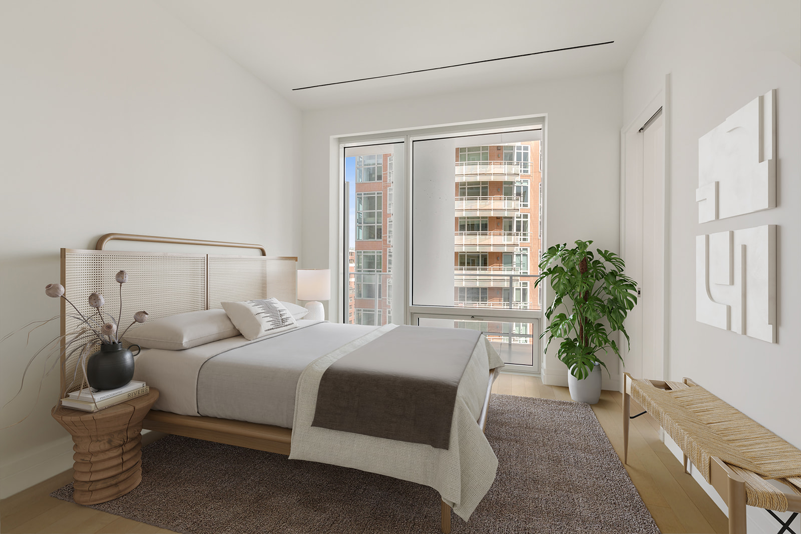 200 East 59th Street, Unit 11C Manhattan, NY 10022 - Photo 5 of 11 a bedroom with a bed and potted plant