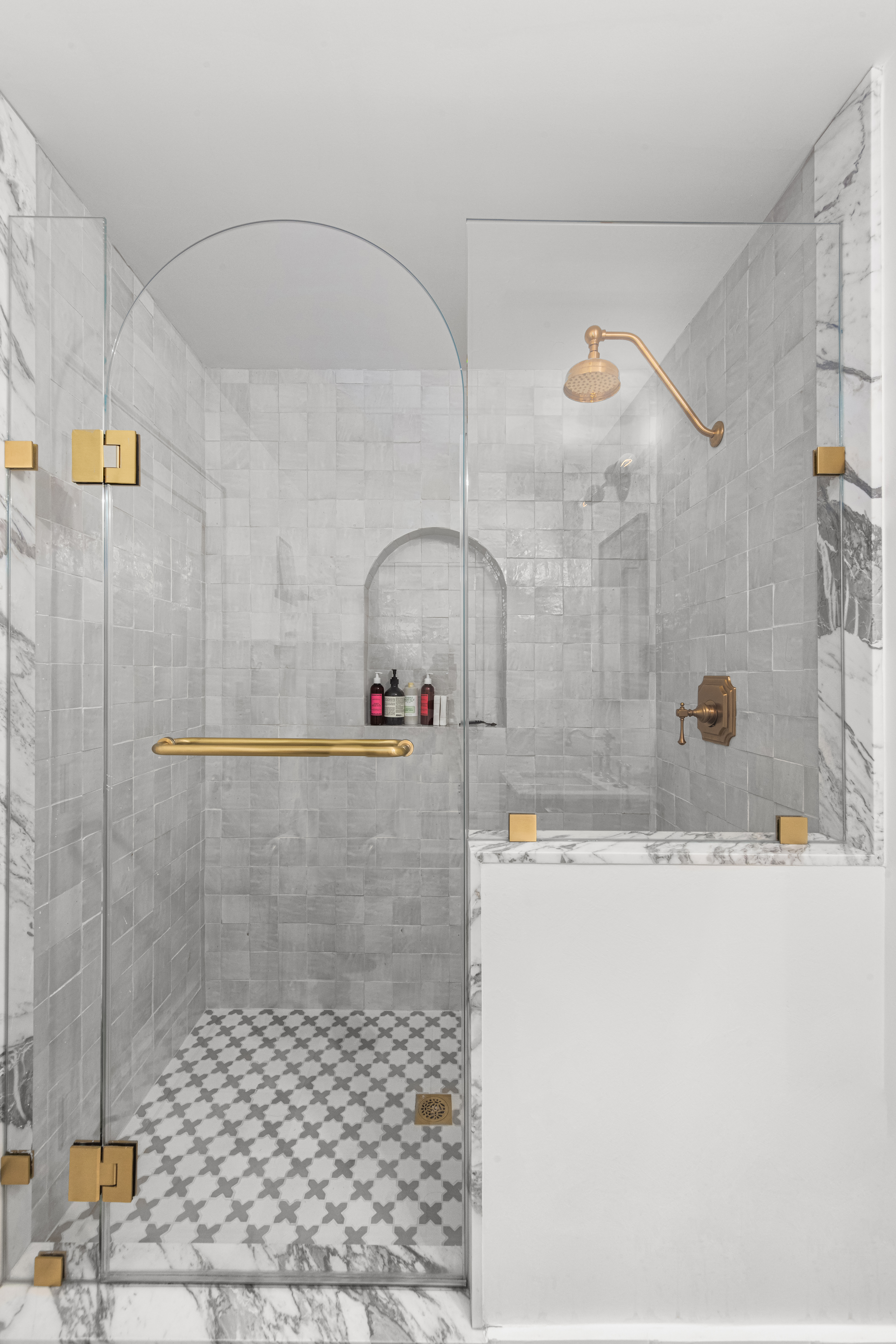 135 East 83rd Street, Unit 8/9C Manhattan, NY 10028 - Photo 12 of 15 a bathroom with a sink and a shower