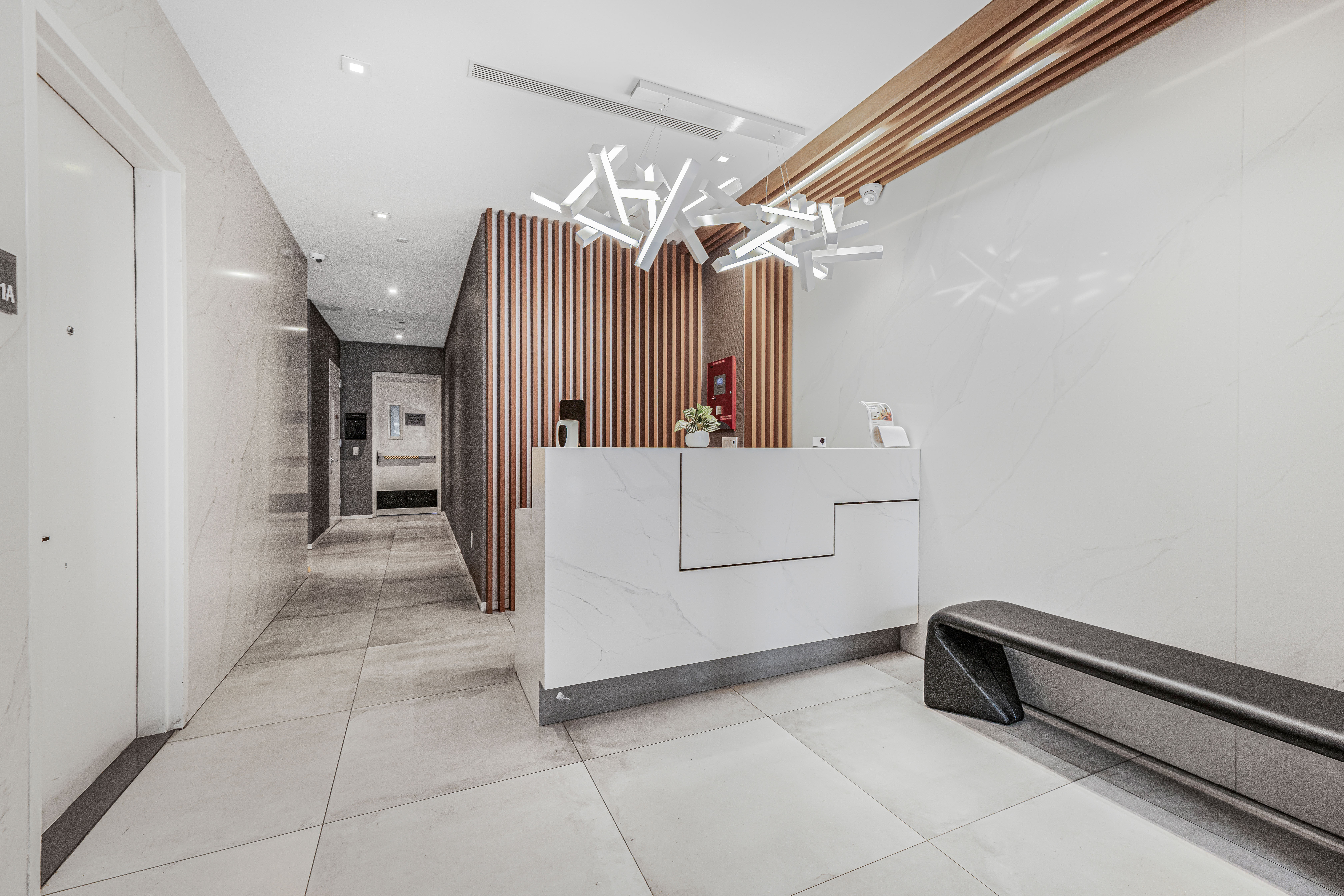 42-50 27th Street, Unit 9C Queens, NY 11101 - Photo 27 of 32 a view of a hallway with entryway