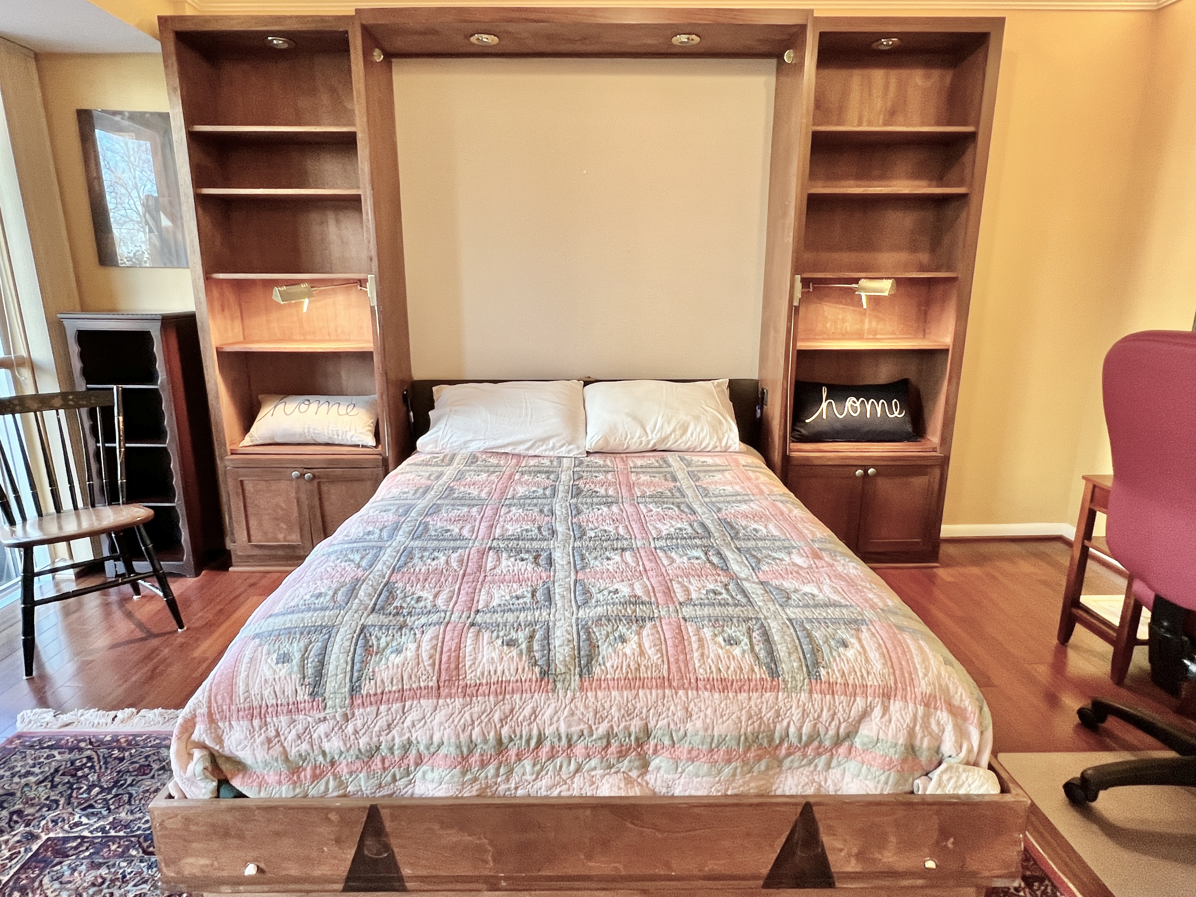 520 N Street Southwest, Unit S112 Washington, DC 20024 - Photo 11 of 40 a large bed sitting in a bedroom next to a window