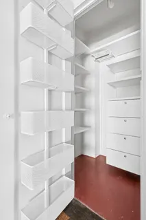 a view of an empty walk in closet