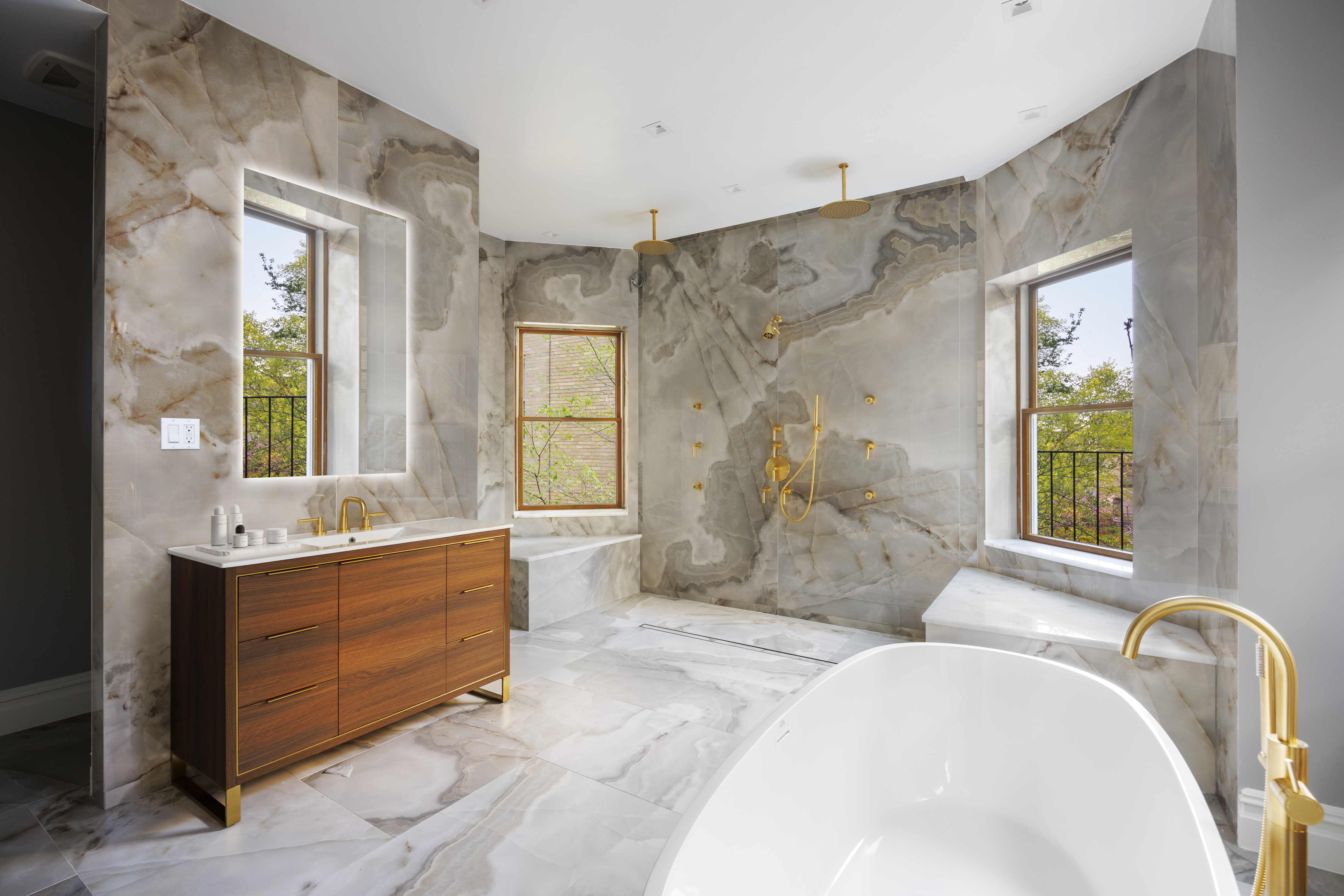 32 Prospect Park West Brooklyn, NY 11215 - Photo 15 of 21 a spacious bathroom with double vanity and a bathtub