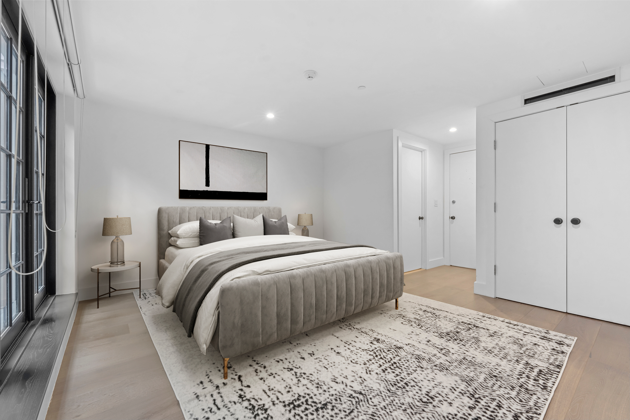 440 West 20th Street Manhattan, NY 10011 - Photo 28 of 35 a bedroom with a bed and a painting