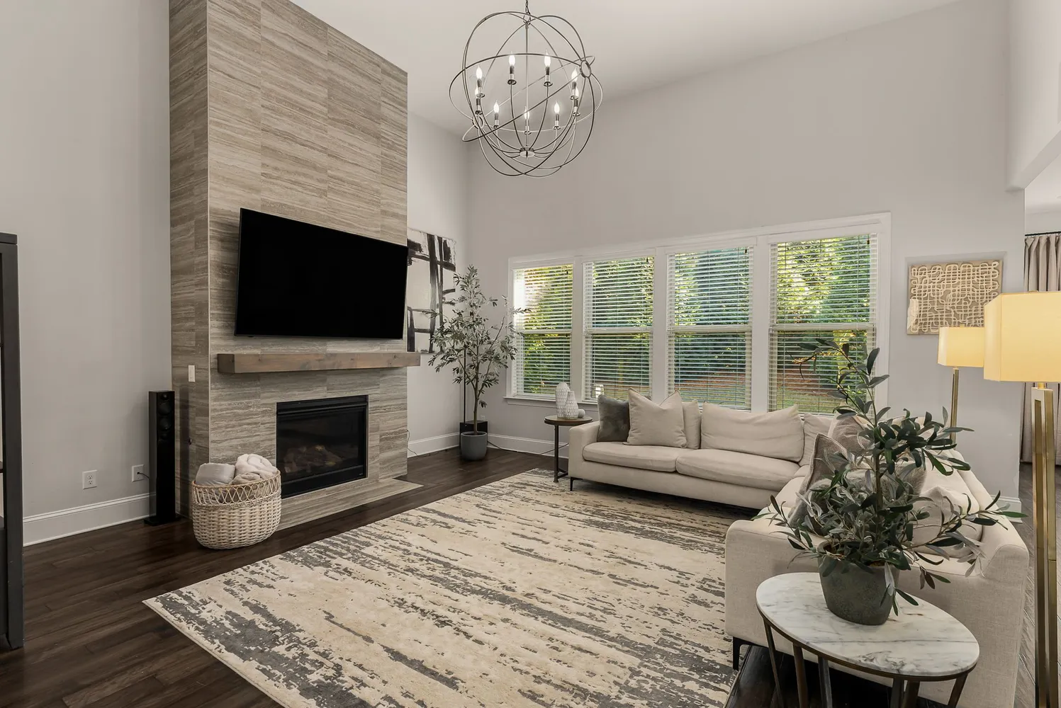 a kitchen with lots of counter space and painting on the wall