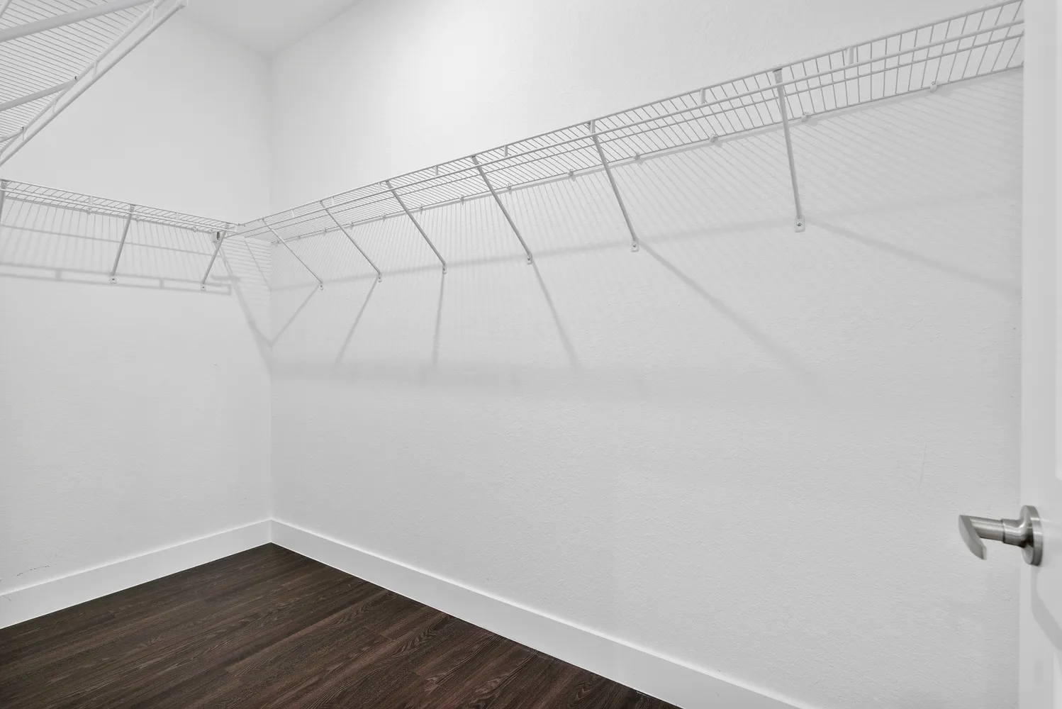a view of a room with racks on the wall