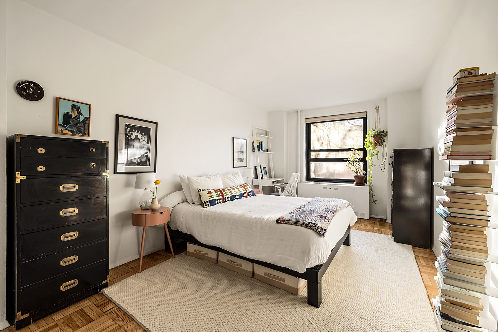 185 Clinton Avenue, Unit 4H Brooklyn, NY 11205 - Photo 4 of 9 a bedroom with a bed and a dresser