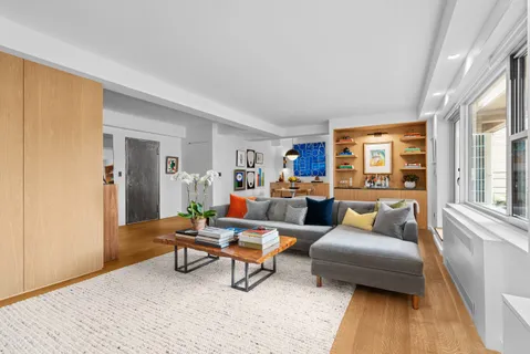 a living room with furniture and a couch