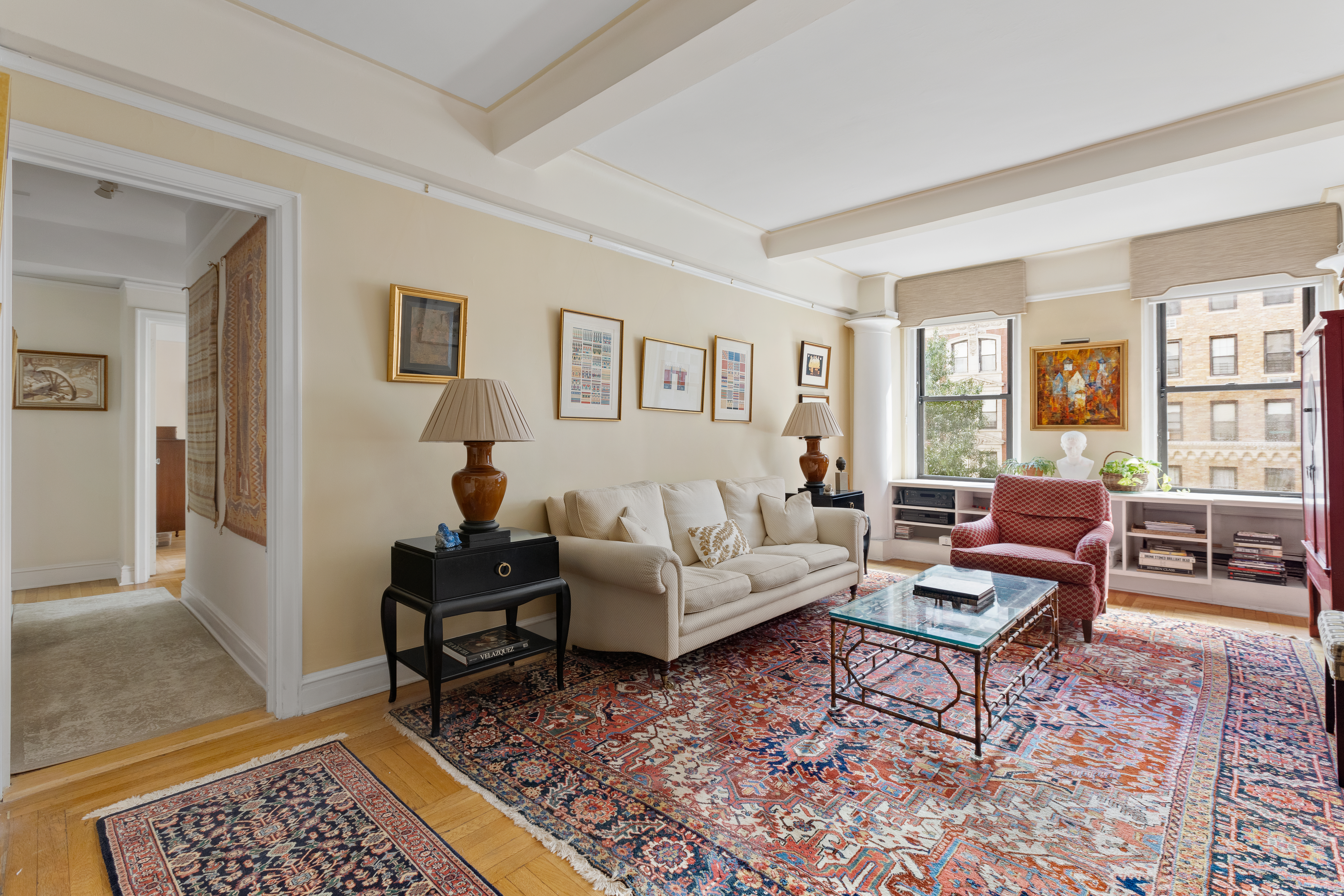 41 West 96th Street, Unit 4B Manhattan, NY 10025 - Photo 2 of 15 a living room with furniture and a rug