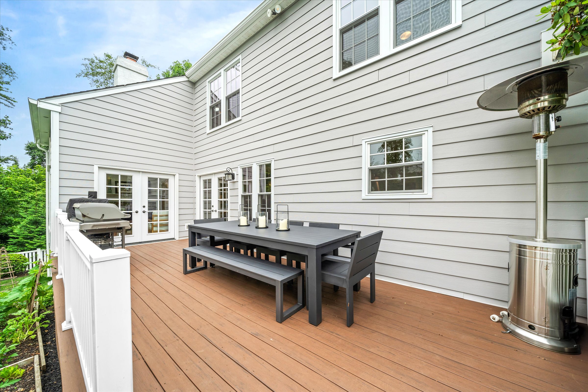 Address Upon Request West Chester, PA 19382 - Photo 58 of 76 a view of a patio with table and chairs with wooden floor and floor to ceiling window