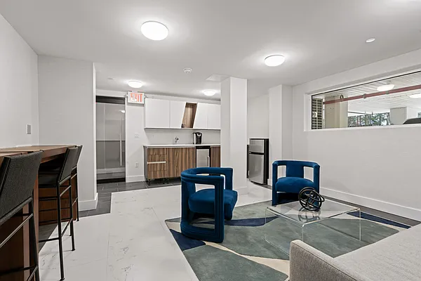 1673 Ocean Avenue, Unit PH4 Brooklyn, NY 11230 - Photo 11 of 13 a workspace with furniture and kitchen view