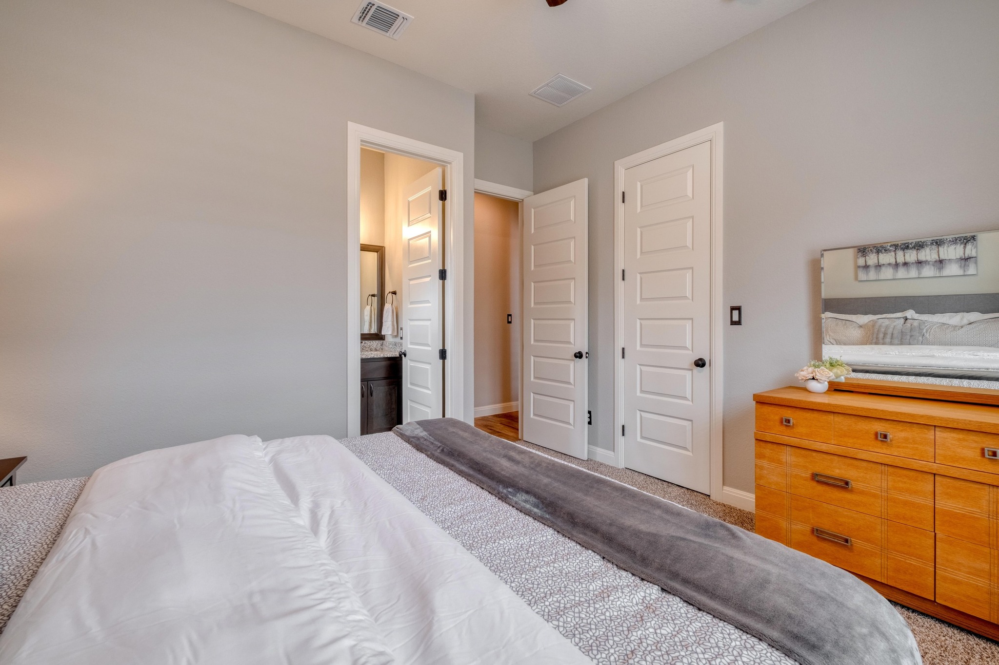 3836 Kyler Glen Road Round Rock, TX 78681 - Photo 33 of 41 a bedroom with a bed and a dresser