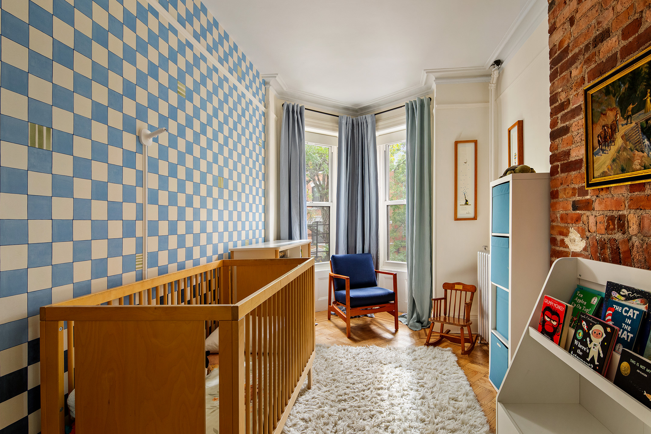 366 6th Avenue Brooklyn, NY 11215 - Photo 12 of 20 a room with furniture and a rug