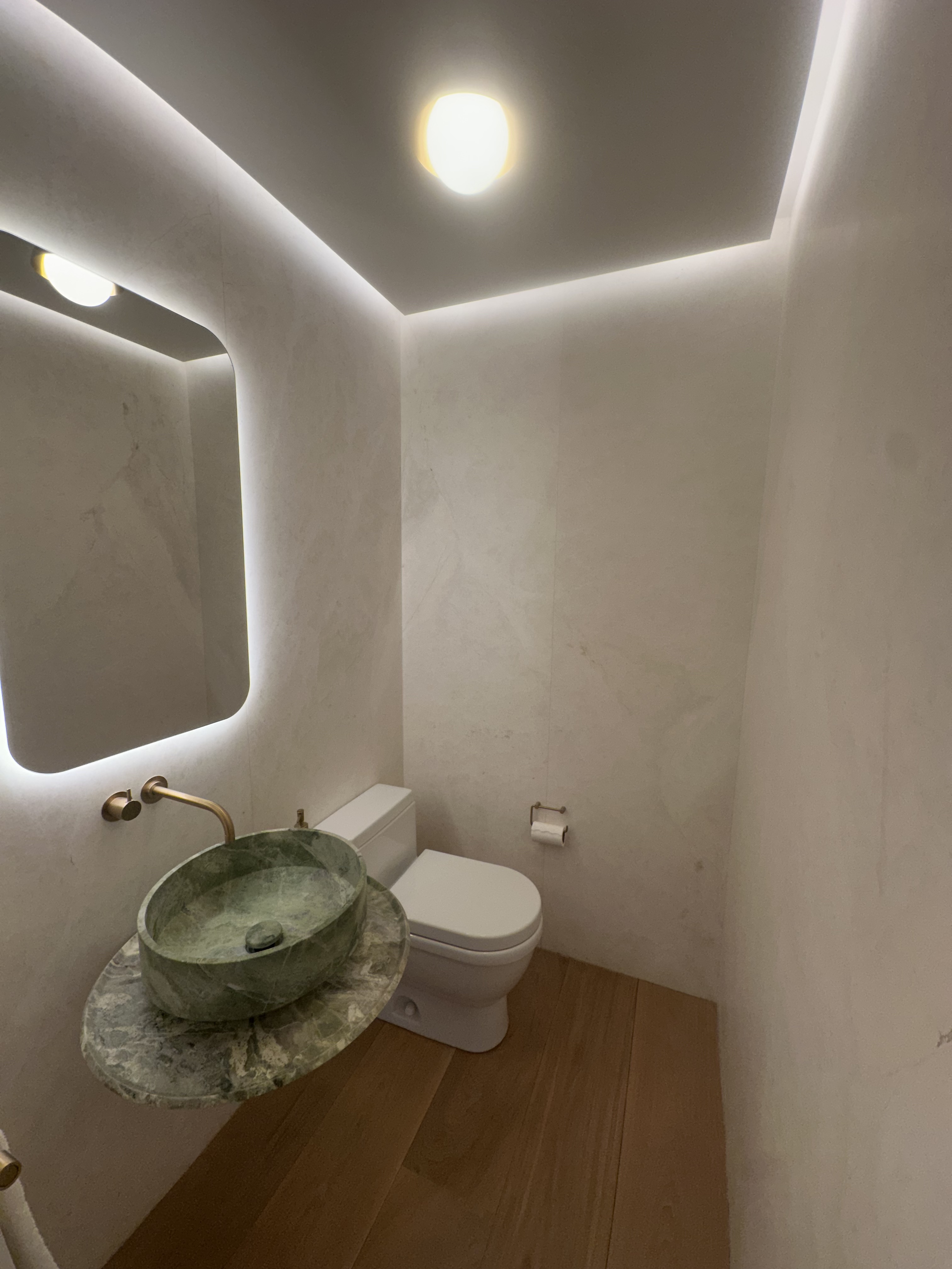 900 Park Avenue, Unit 7ABCE Manhattan, NY 10075 - Photo 16 of 18 a bathroom with a toilet and a sink