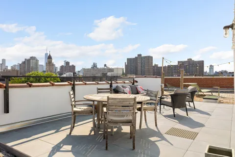 a view of a terrace with furniture