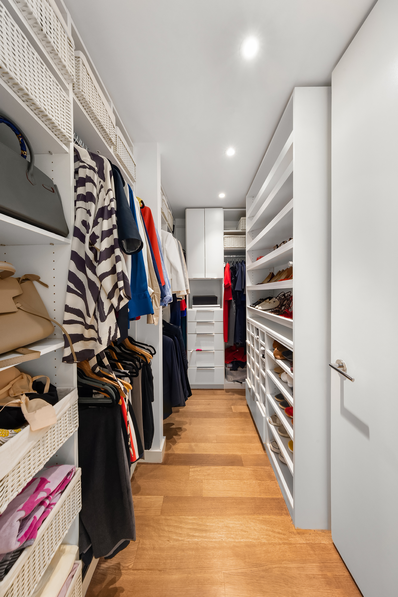 1 Grand Army Plaza, Unit 3C Brooklyn, NY 11238 - Photo 13 of 23 a view of walk in closet with clothes and shoes