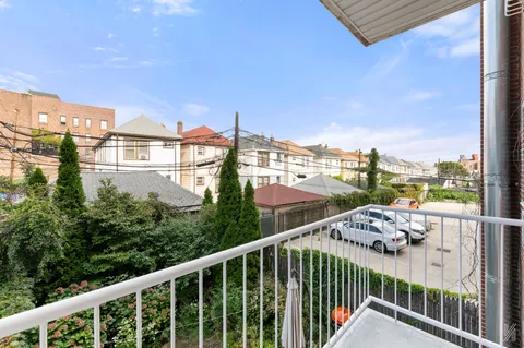 a view of a balcony with city view