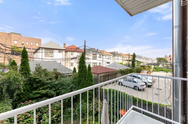 a view of a balcony with city view
