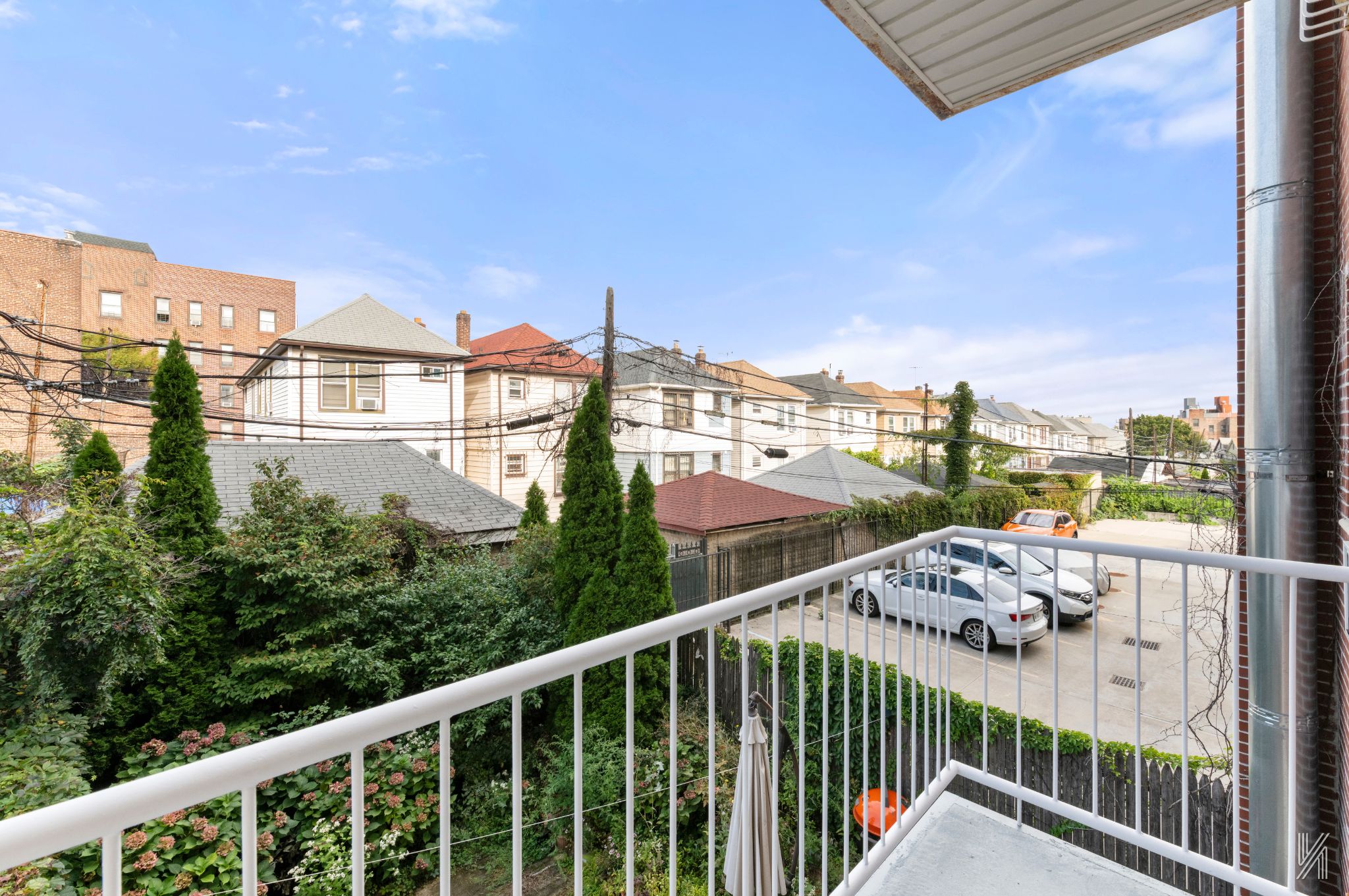 41-36 66th Street, Unit 2B Queens, NY 11377 - Photo 16 of 19 a view of a balcony with city view