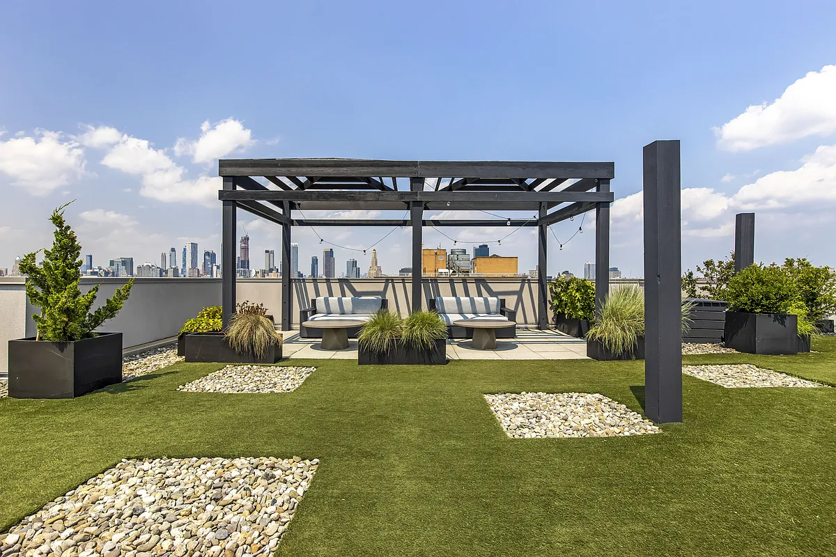 267 6th Street, Unit 4C Brooklyn, NY 11215 - Photo 7 of 14 a view of a chairs and table in patio with a garden