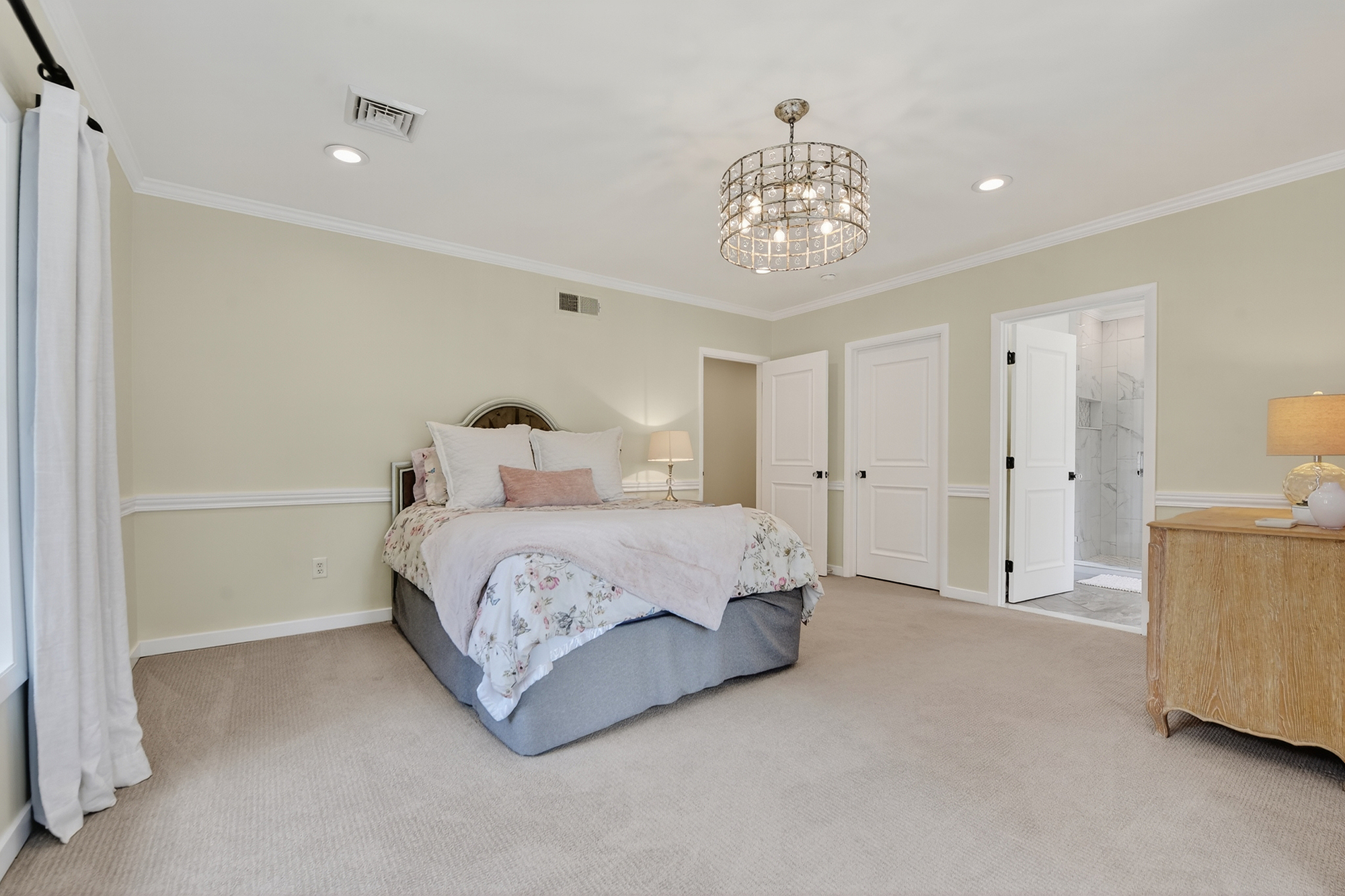 1205 Beaver Road Sewickley, PA 15143 - Photo 67 of 94 a spacious bedroom with a bed and a chandelier