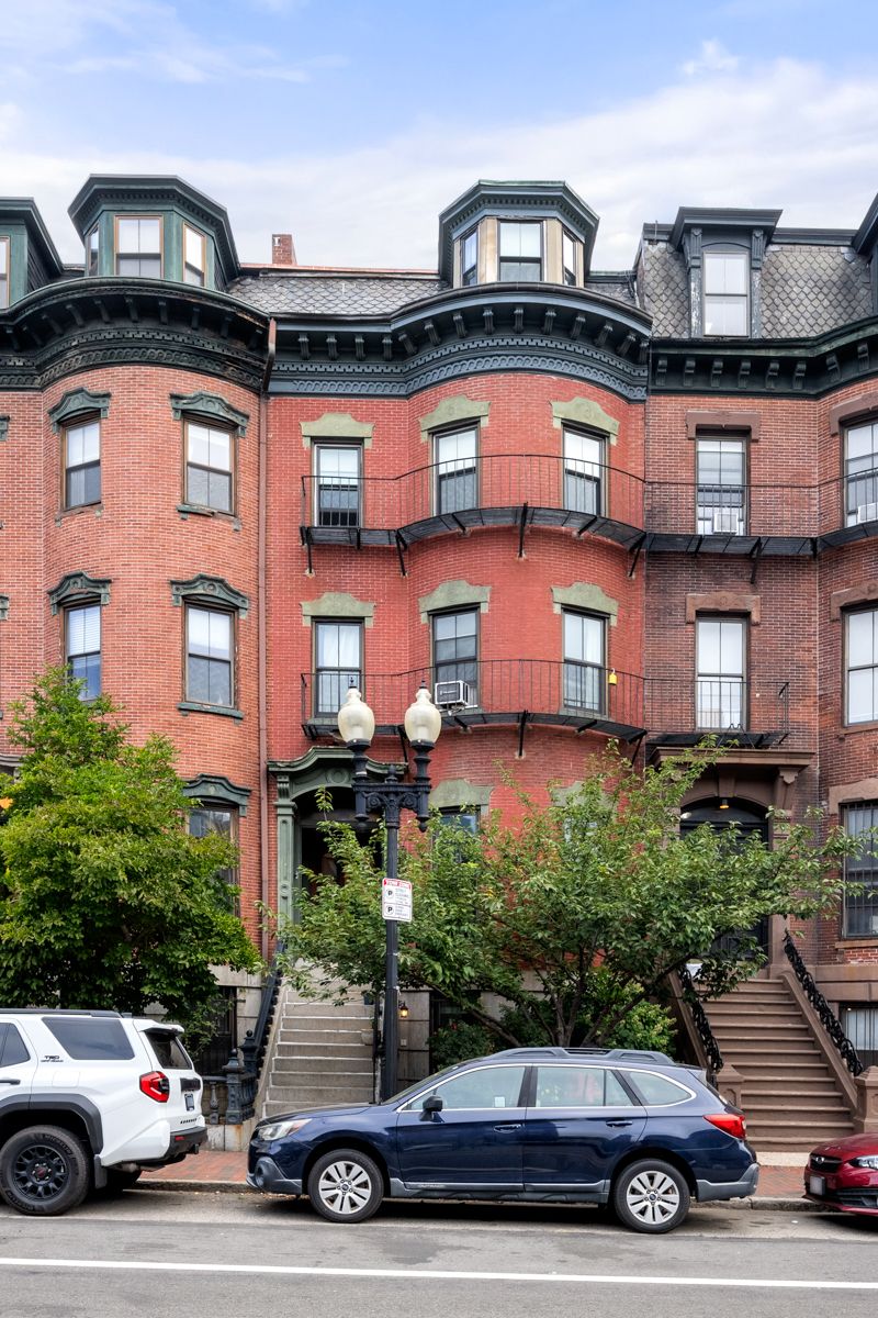 484 Massachusetts Avenue, Unit 1 Boston, MA 02118 - Photo 20 of 20 a car parked in front of a house