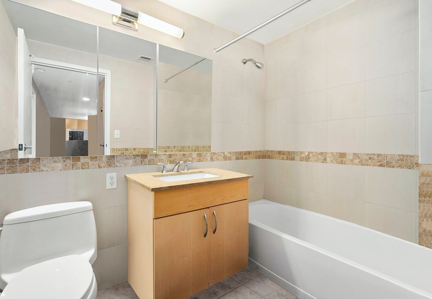 40 West 116th Street, Unit B503 Manhattan, NY 10026 - Photo 12 of 36 a bathroom with a sink a toilet and a bathtub