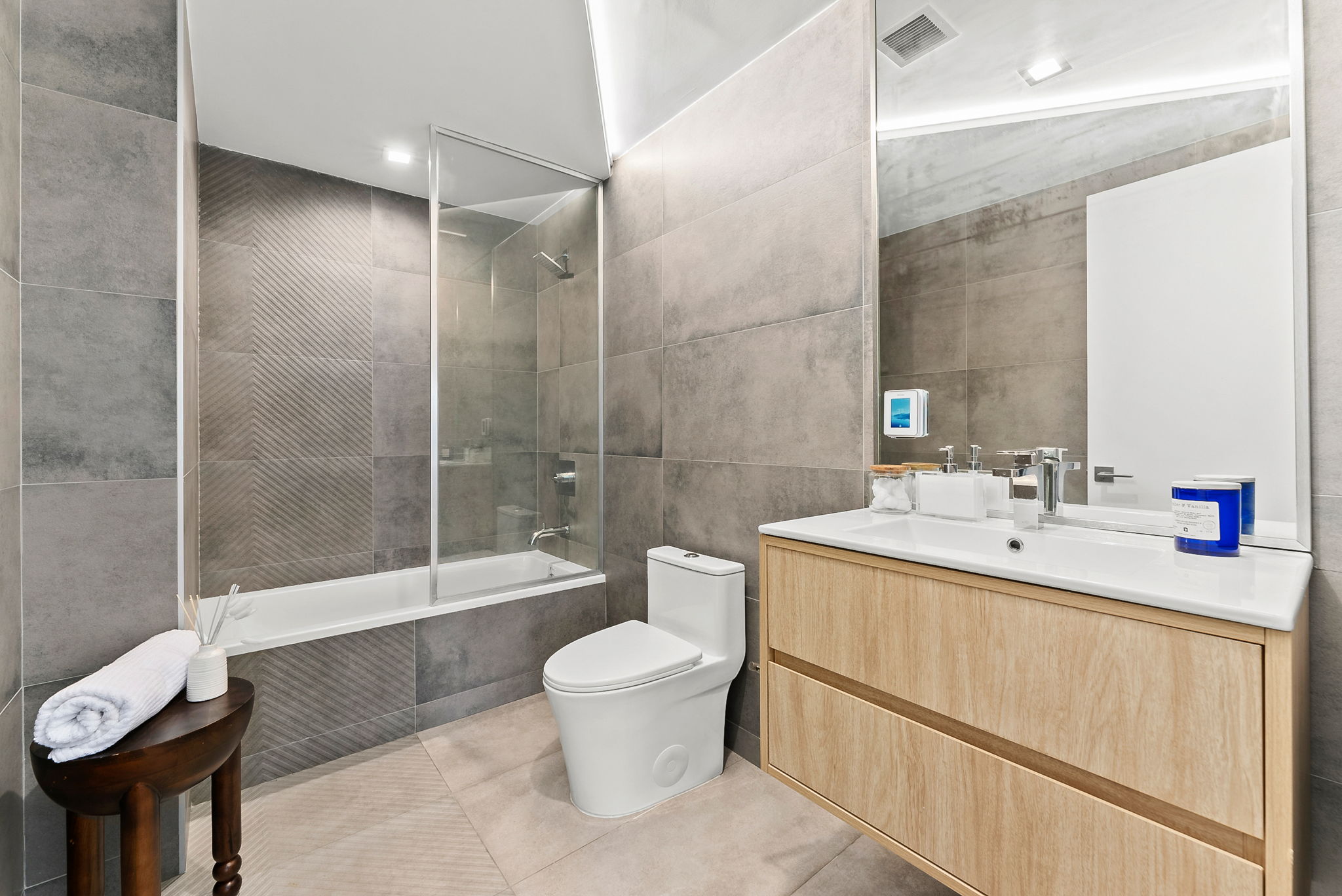 553 West 182nd Street, Unit 5R Manhattan, NY 10033 - Photo 9 of 12 a bathroom with a sink a toilet and shower