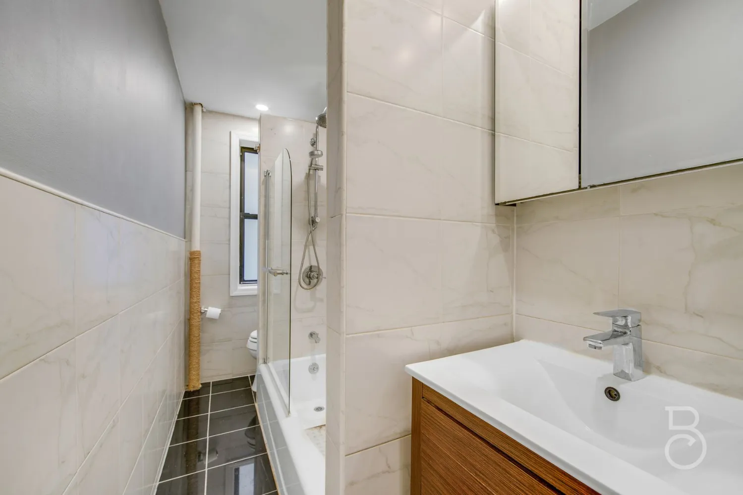 a bathroom with a sink and a tub