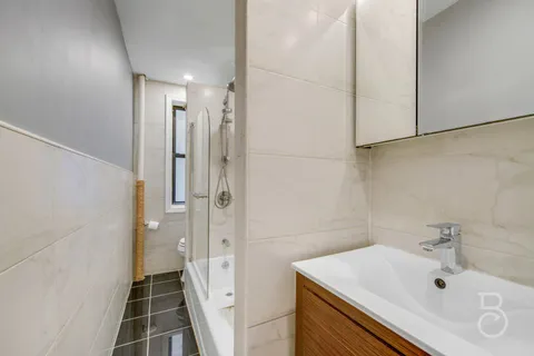 a bathroom with a sink and a tub