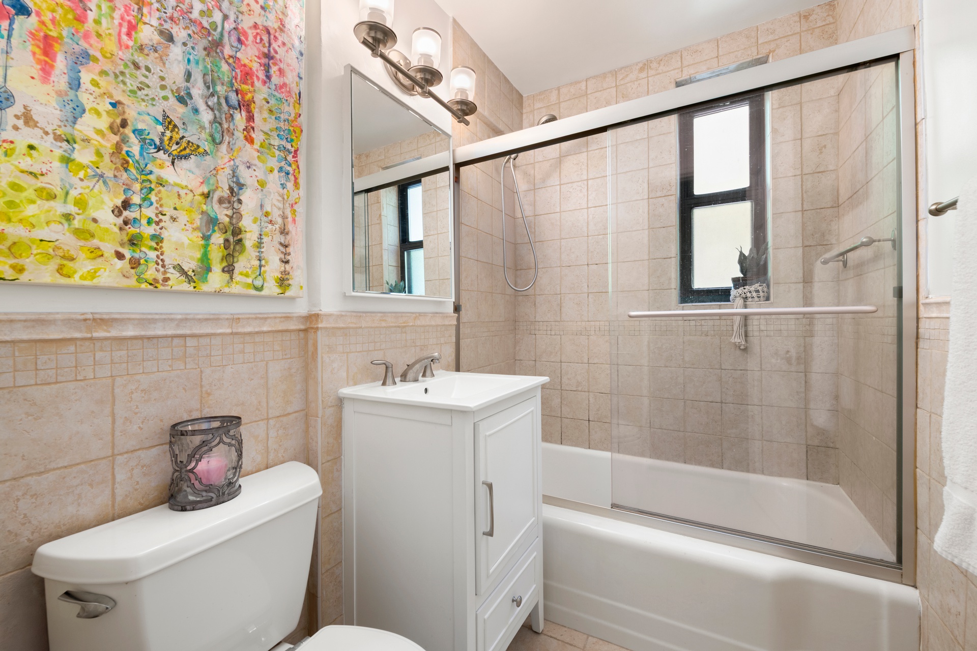 330 East 80th Street, Unit 2F Manhattan, NY 10075 - Photo 6 of 7 a bathroom with a toilet a sink and a bathtub