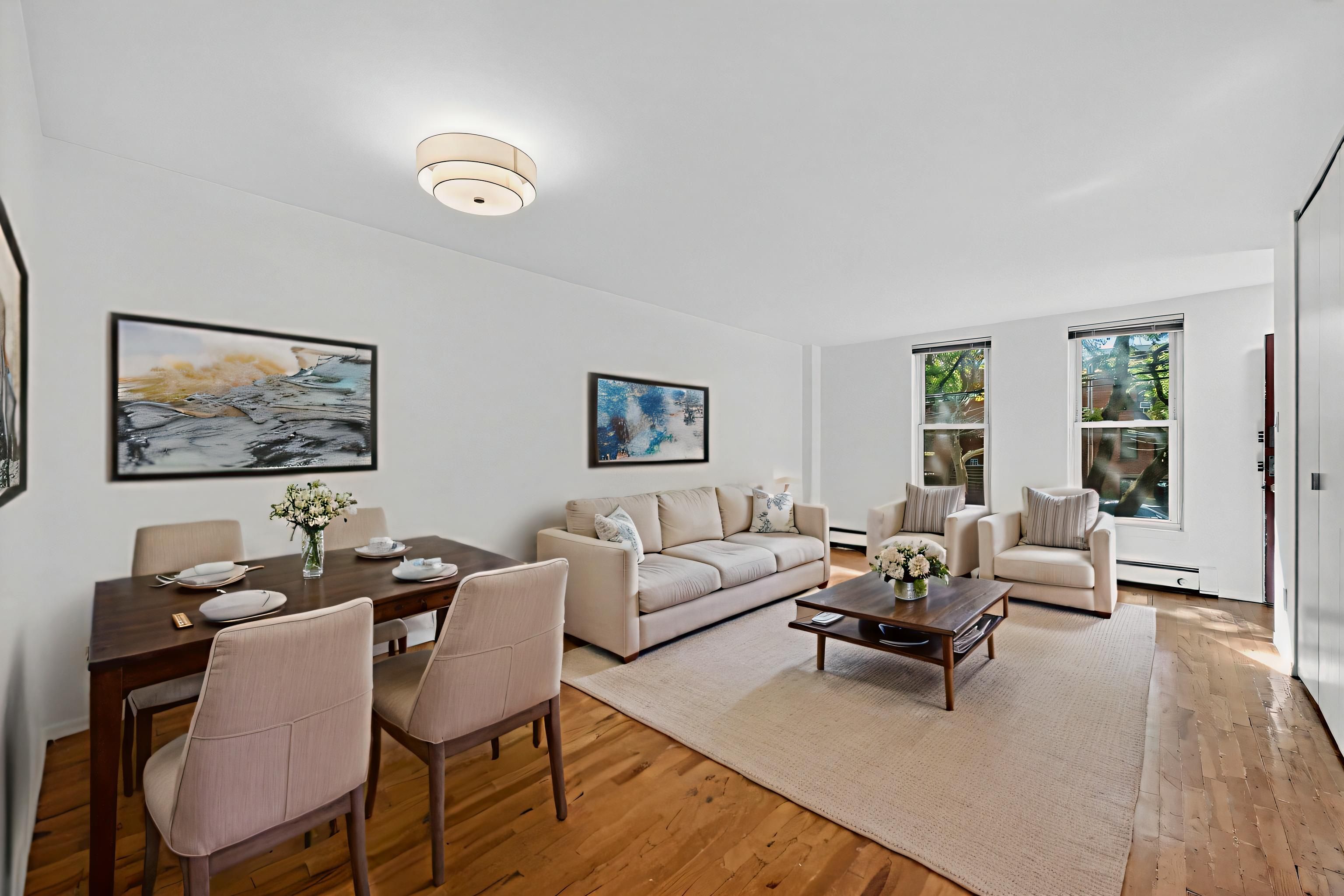 81 President Street, Unit 51-A Brooklyn, NY 11231 - Photo 9 of 27 a living room with couches a coffee table and next to a window