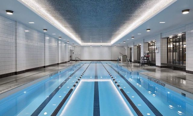 a view of a living room filled with furniture