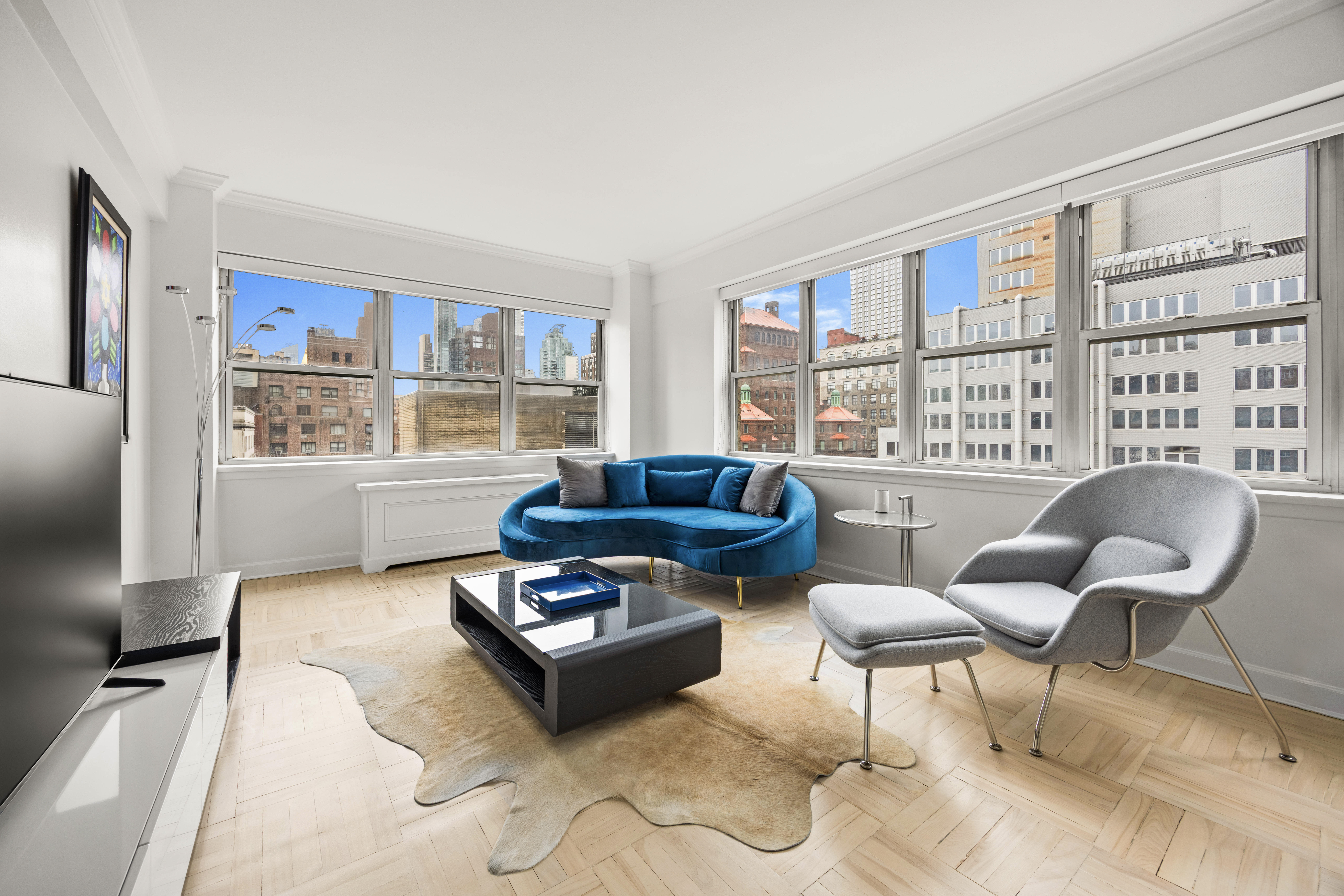 a living room with furniture and a window