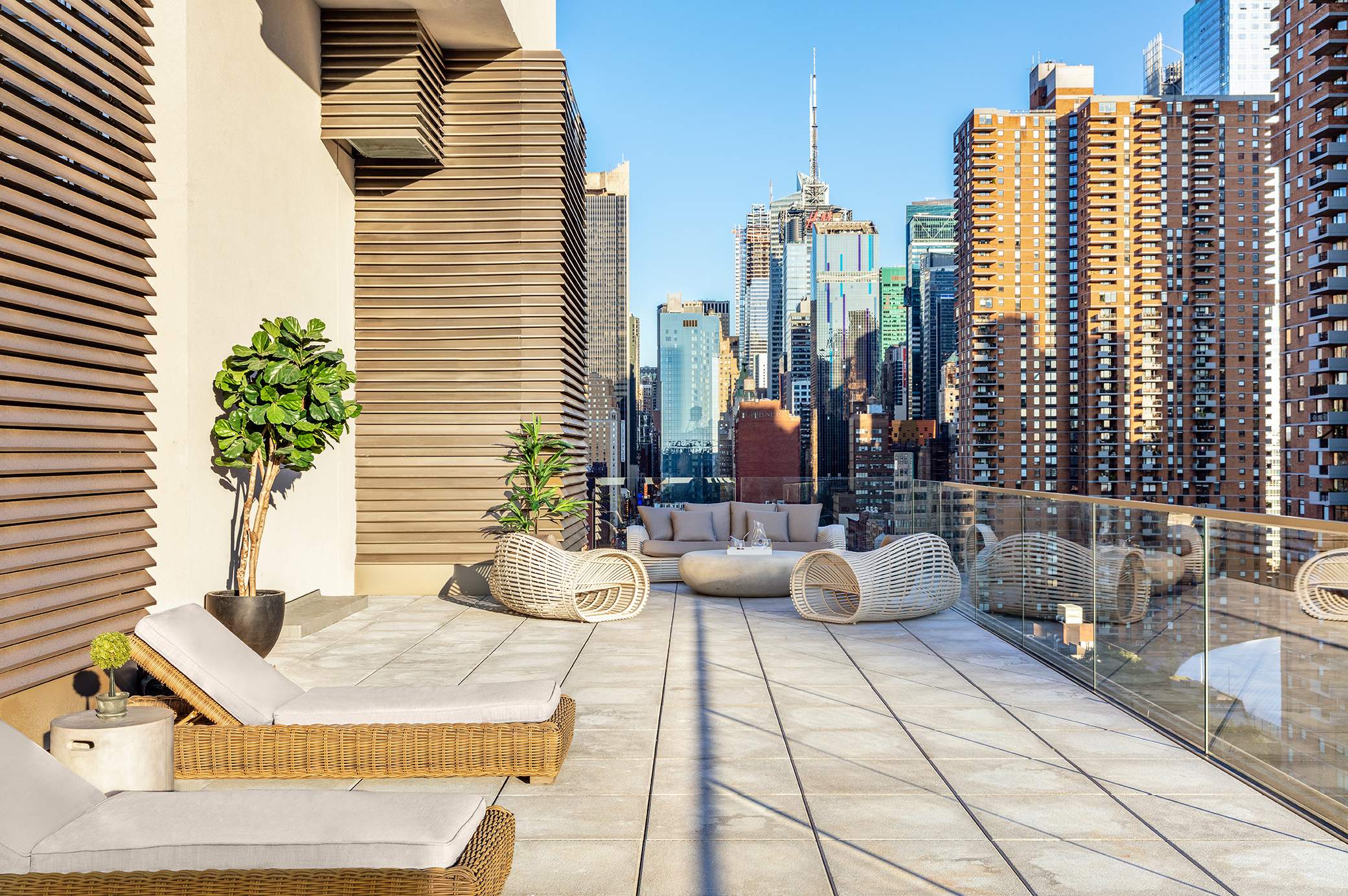 505-513 West 43rd Street, Unit 6K Manhattan, NY 10036 - Photo 13 of 16 a view of balcony with seating space and city view
