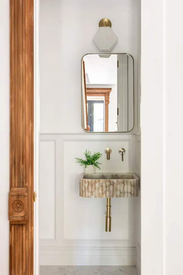 a spacious bedroom with a bed and a couch