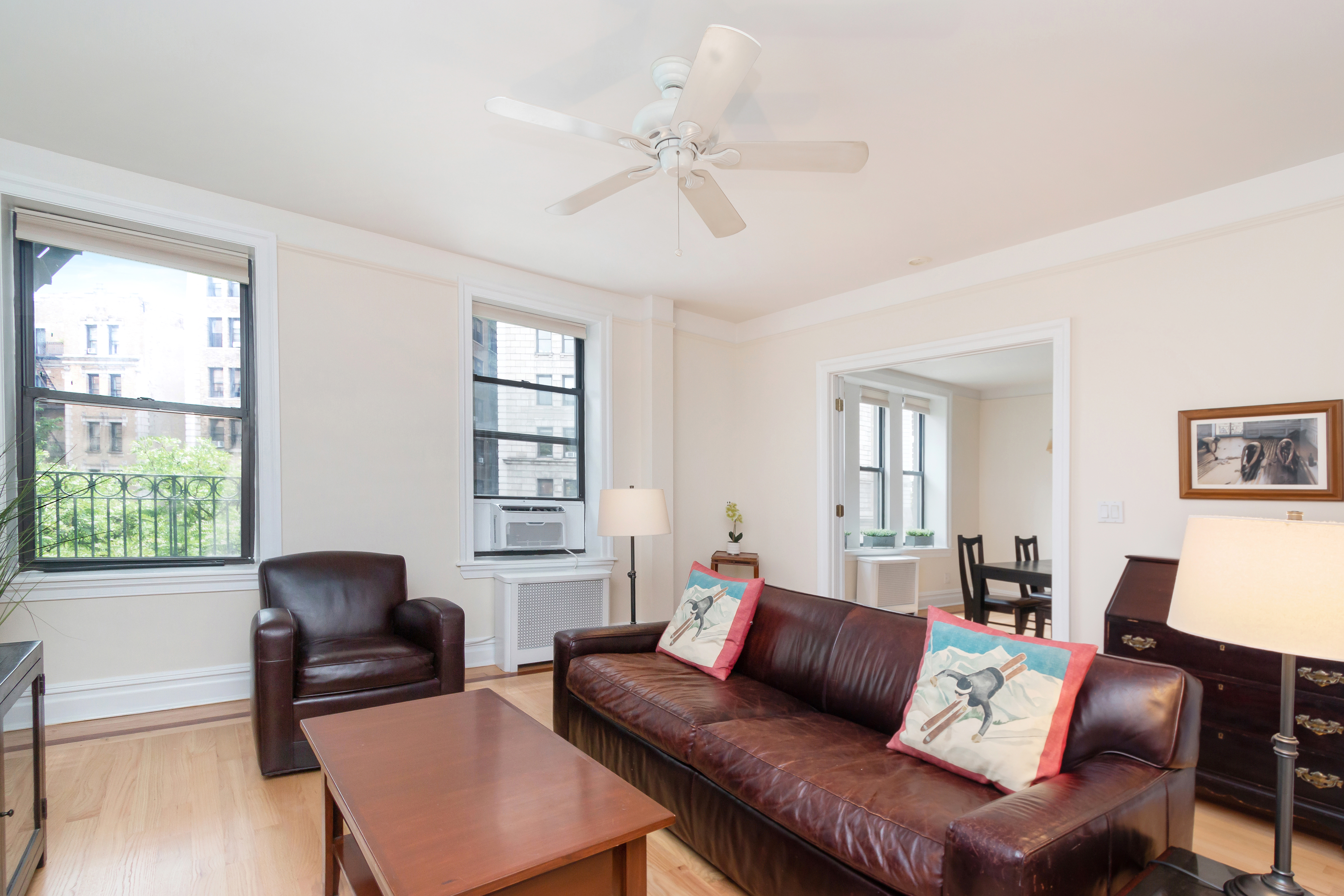 801 Riverside Drive, Unit 4F Manhattan, NY 10032 - Photo 2 of 13 a living room with furniture and a window