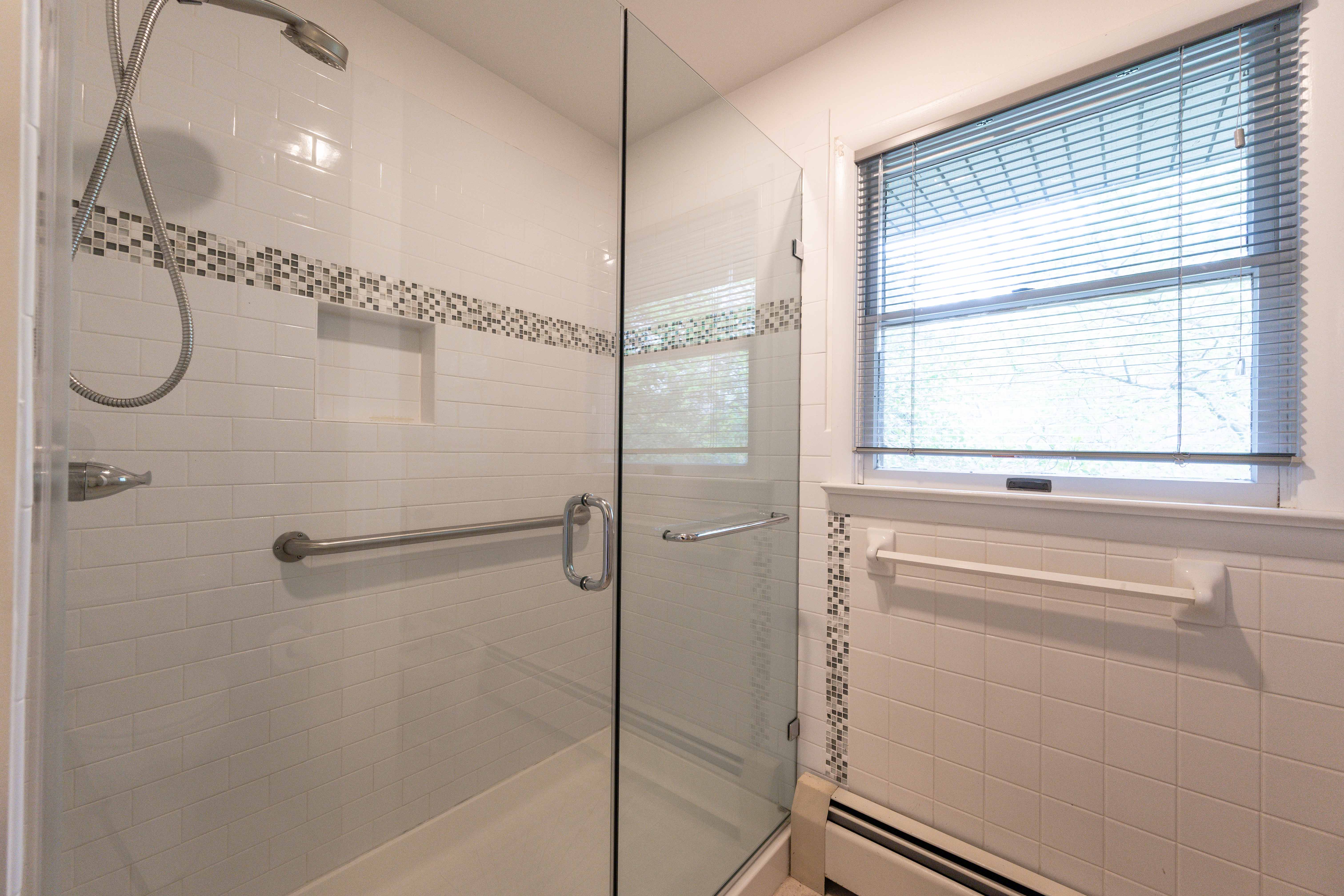 21730 Peach Tree Road Dickerson, MD 20842 - Photo 7 of 11 a bathroom with a shower and a window