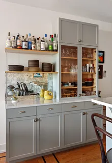 a kitchen with stainless steel appliances granite countertop a sink and cabinets