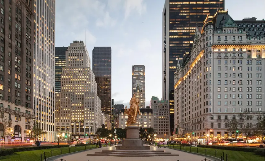 a view of a city with tall buildings