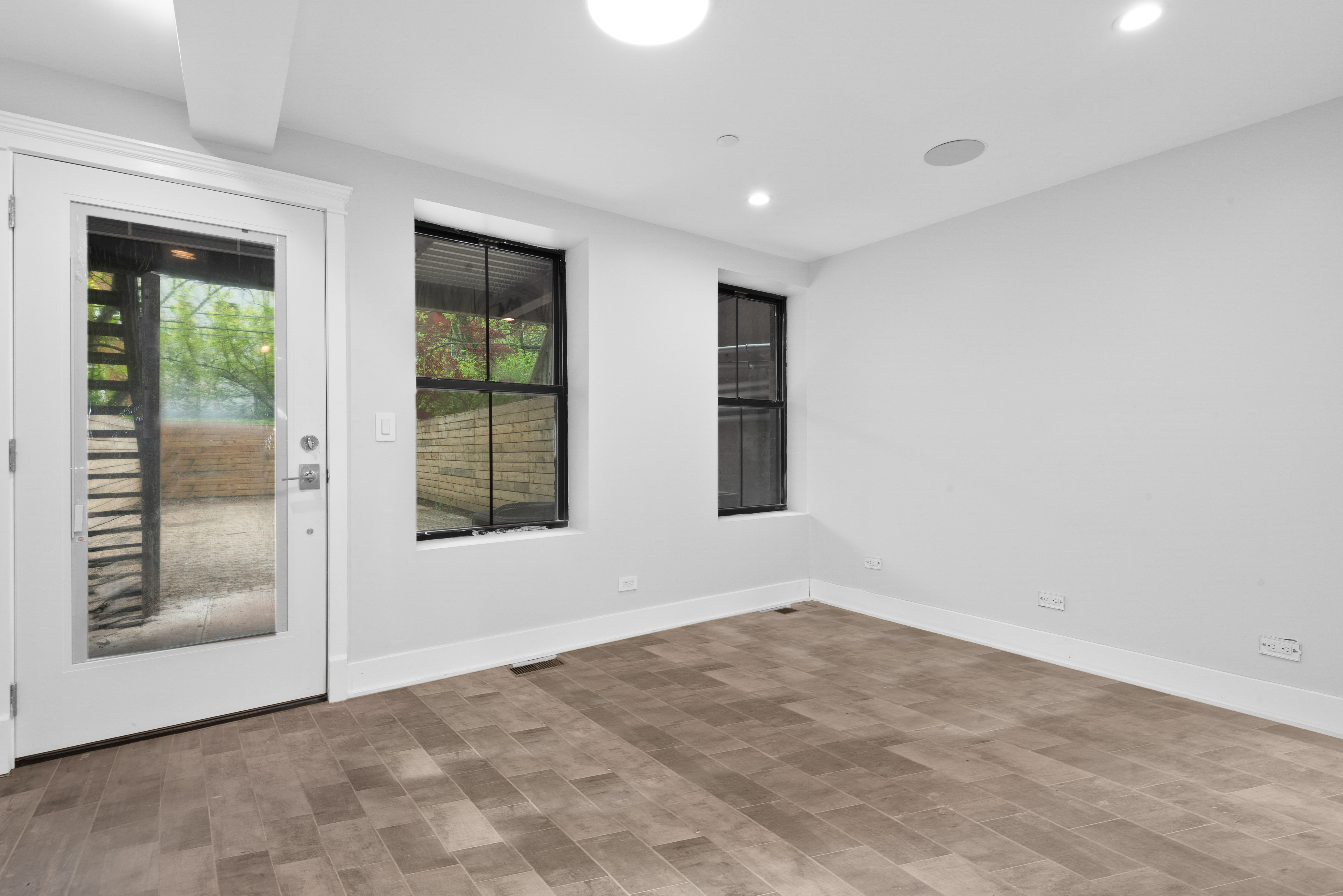 560 Hancock Street, Unit 2 Brooklyn, NY 11233 - Photo 3 of 6 a view of an empty room with a window