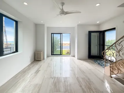 a view of an empty room and window