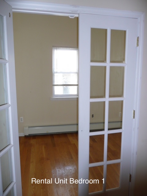 266 18th Street Brooklyn, NY 11215 - Photo 16 of 20 a view of an empty room with a window