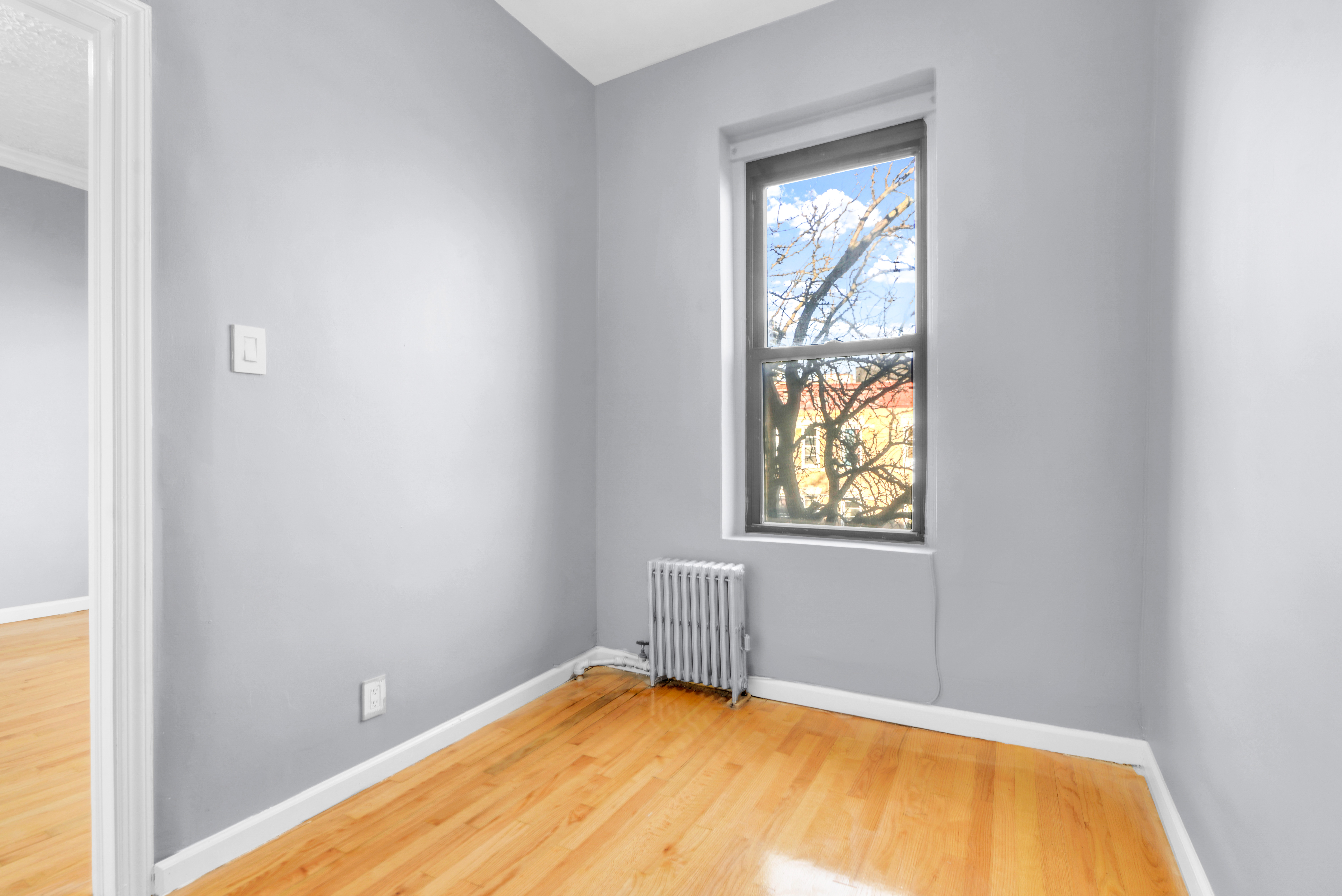 2302 Bedford Avenue, Unit 3 Brooklyn, NY 11226 - Photo 14 of 25 a view of an empty room with window