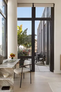 a living room with large window