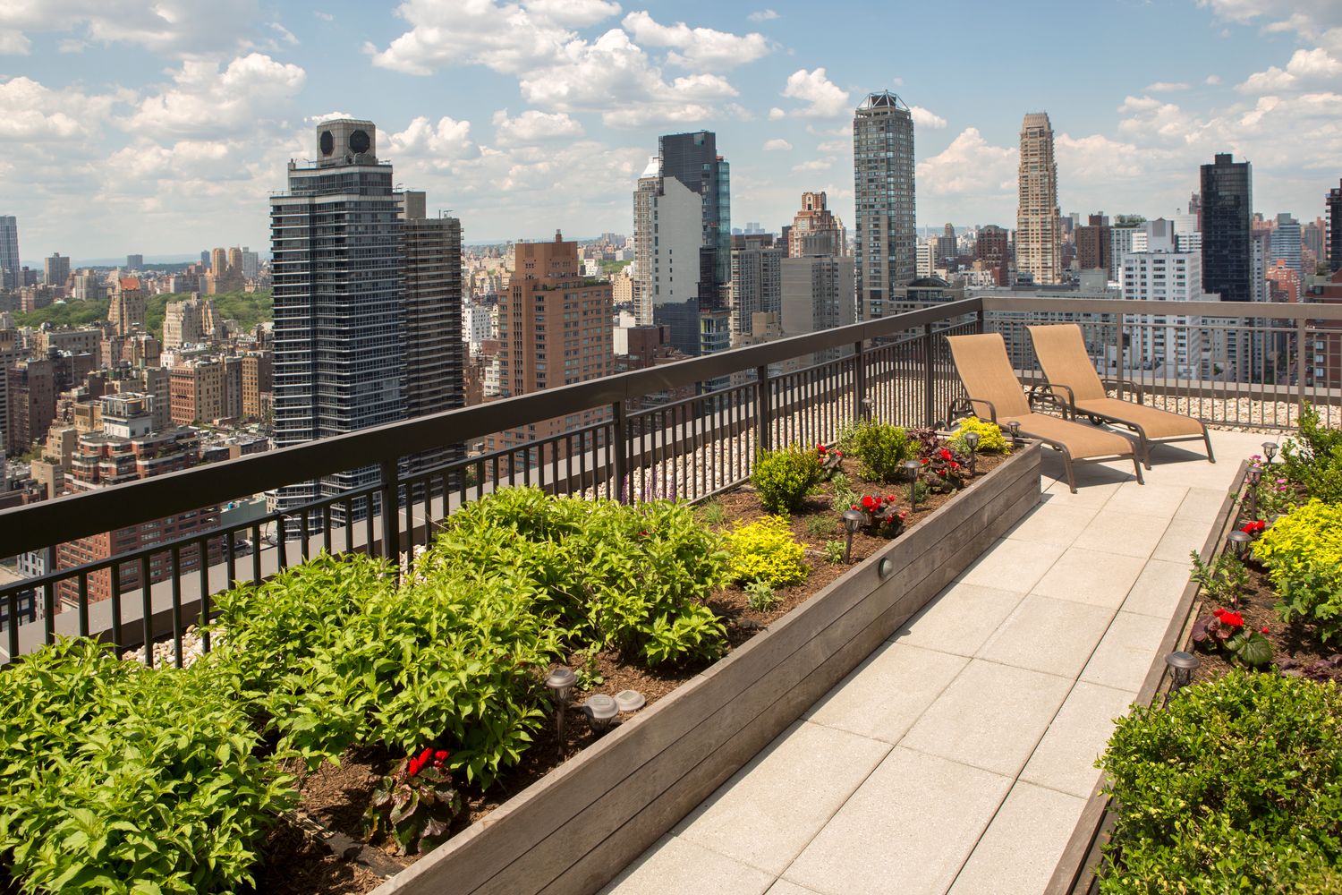 300 East 59th Street, Unit 803 Manhattan, NY 10022 - Photo 10 of 14 a view of a city with a large pool and outdoor seating