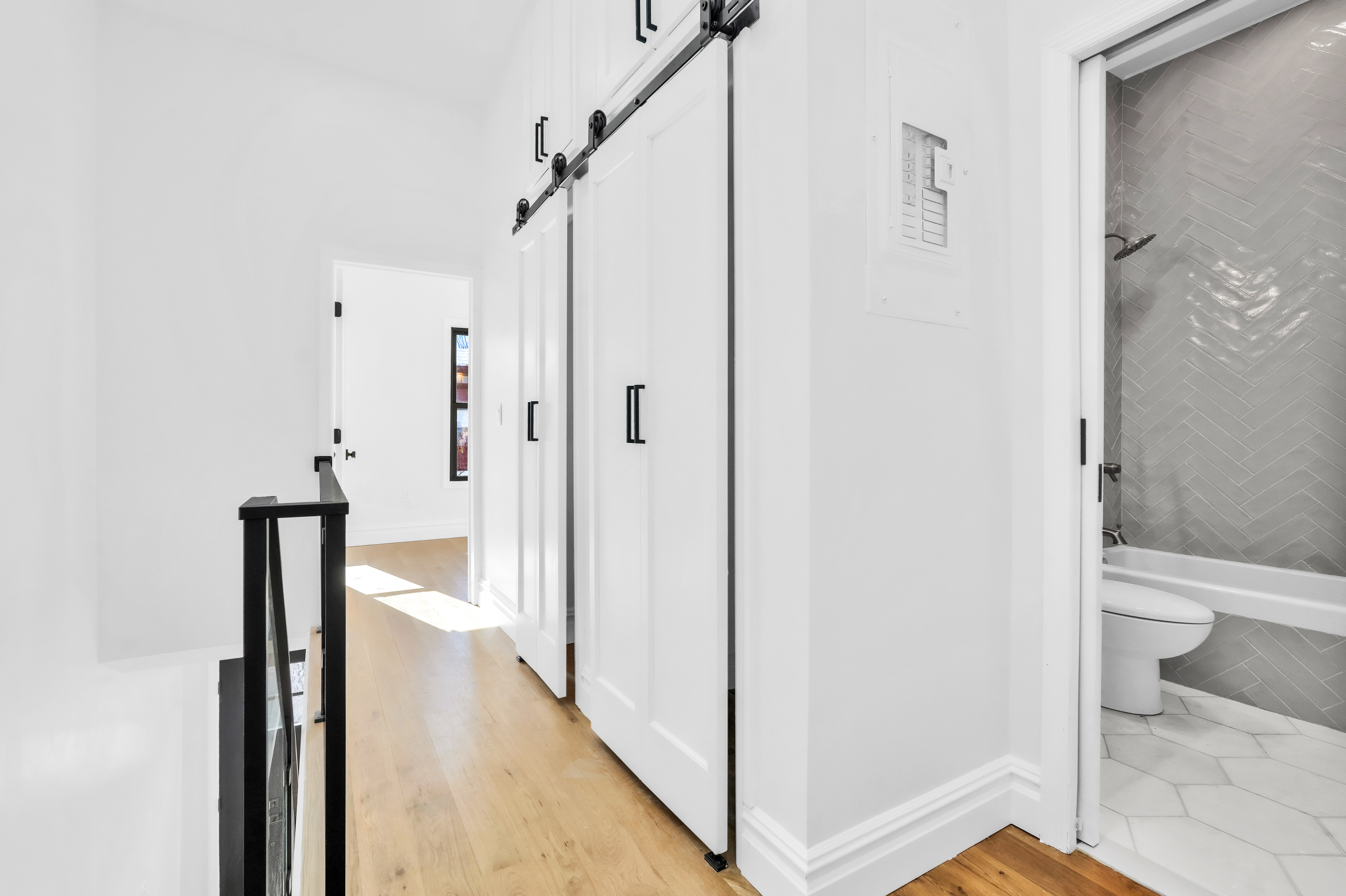 473 Monroe Street Brooklyn, NY 11221 - Photo 26 of 40 a bathroom with a shower and toilet